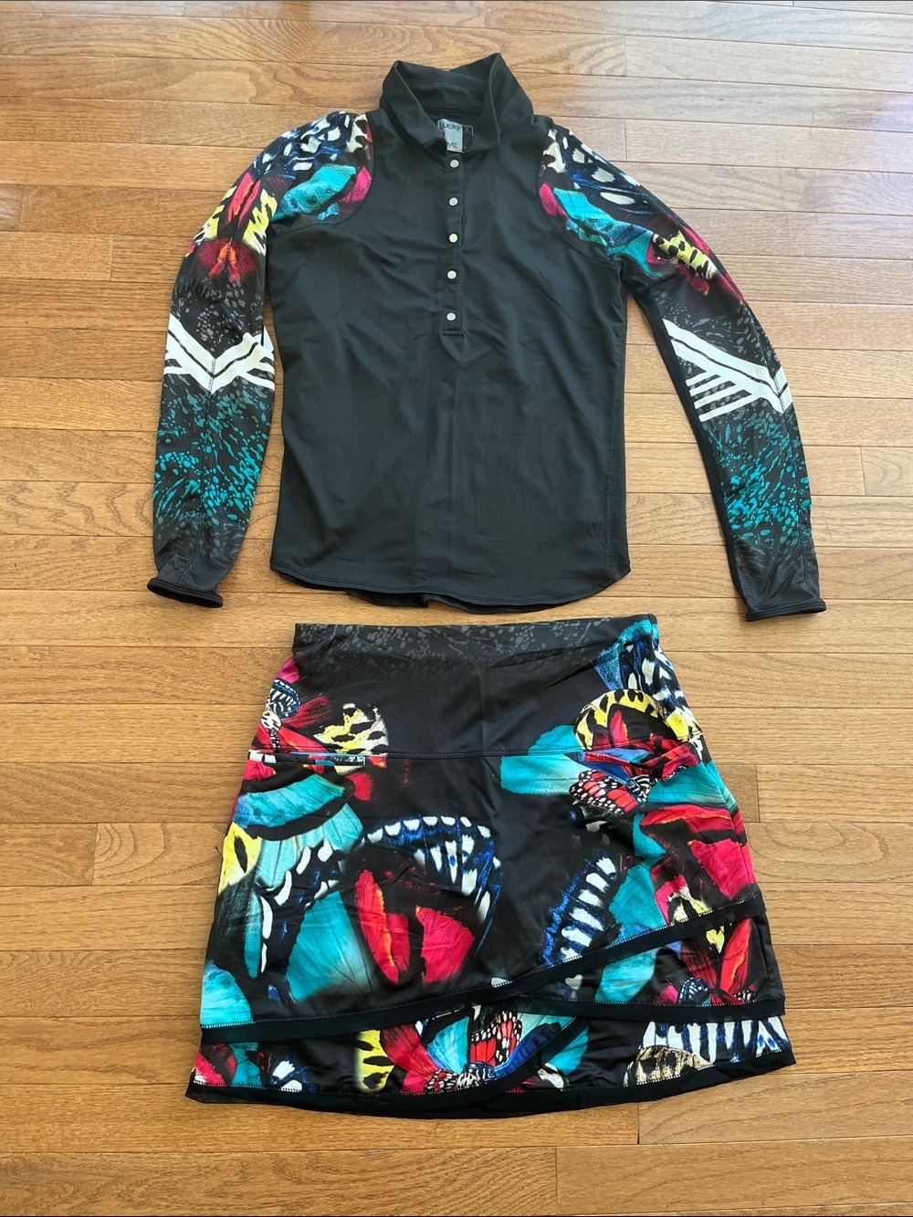 Lucky in Love Black Long-Sleeve Rash Top with Multicolor Floral Sleeves & Skort